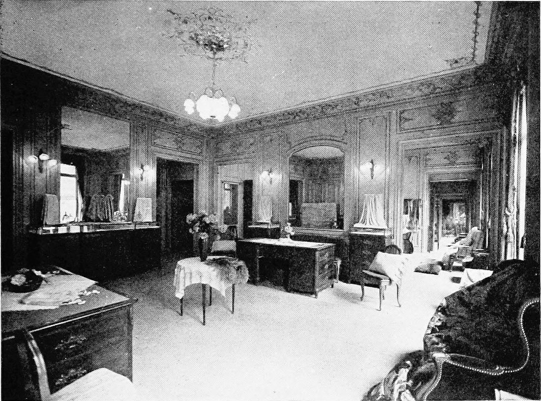 A black and white illustration of the elegant salons of the House of Worth in Paris