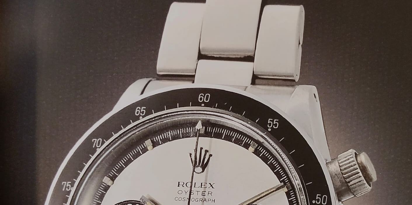 A steel Rolex Daytona ref. 6263 chronograph with a white dial and three black sub-dials