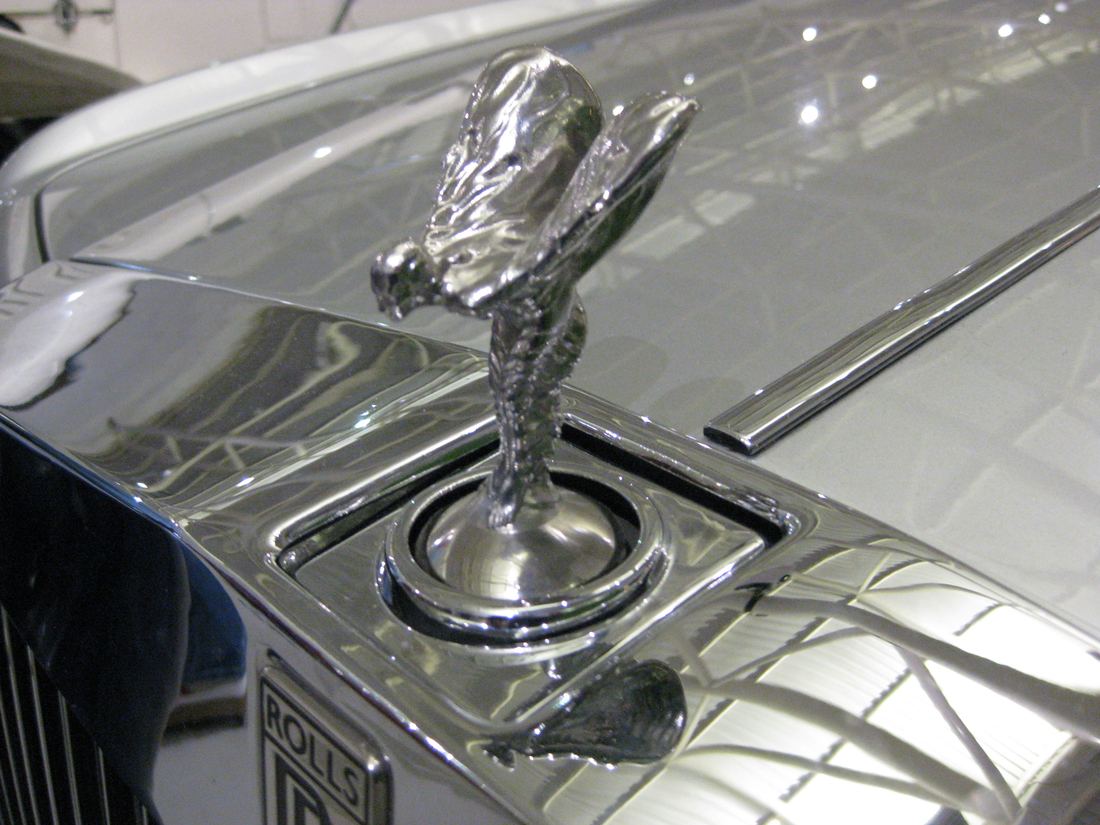 The silver Spirit of Ecstasy mascot on the bonnet of a Rolls-Royce