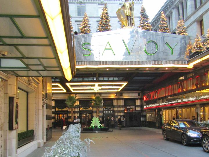 The entrance court of the Savoy Hotel in London with its steel Savoy sign above the canopy